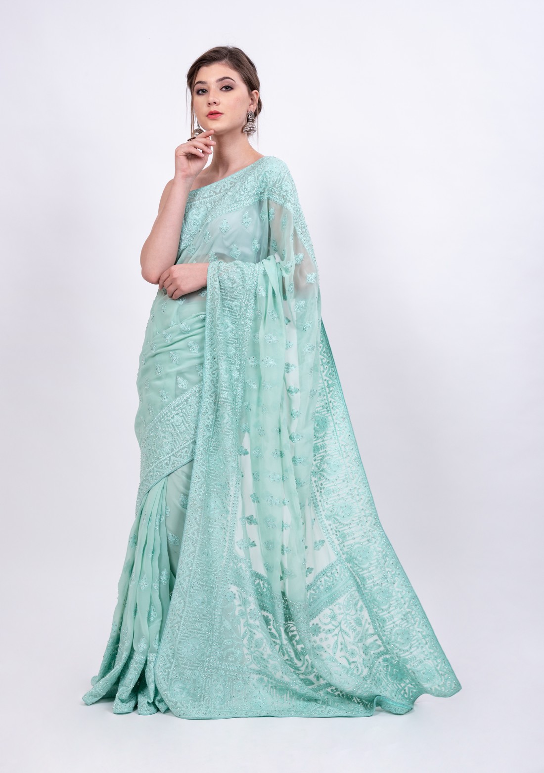 Thread Embroidered Mint Green Georgette Saree with Stone Embellishment