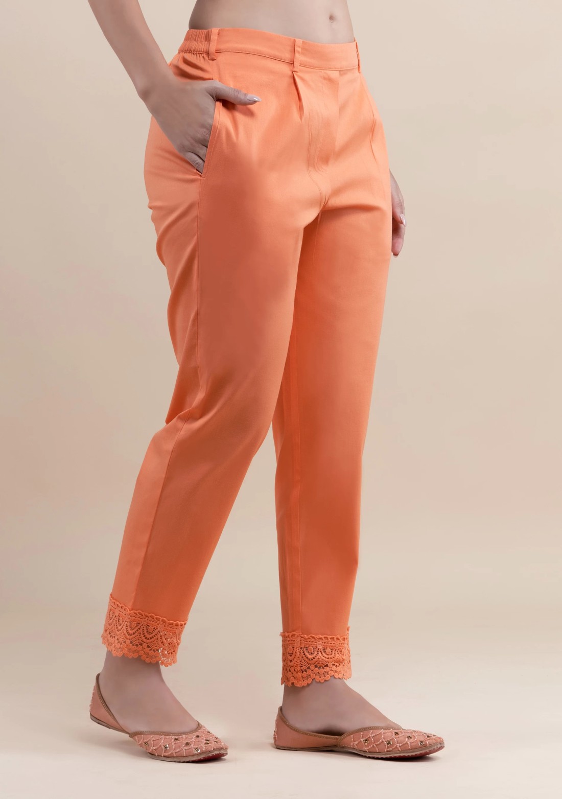 Peach Cotton Lycra Narrow Hem Pants With Lace