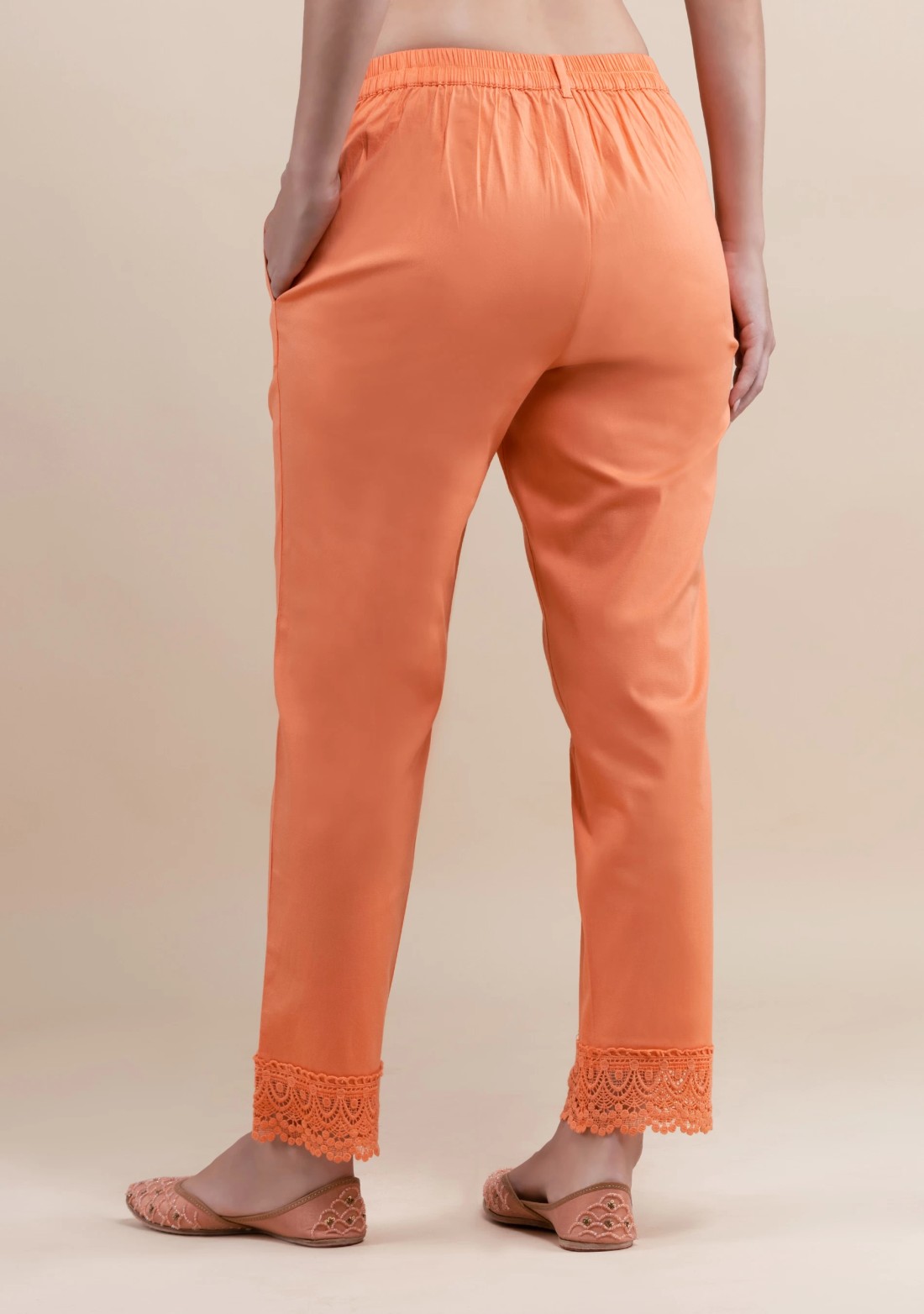 Peach Cotton Lycra Narrow Hem Pants With Lace