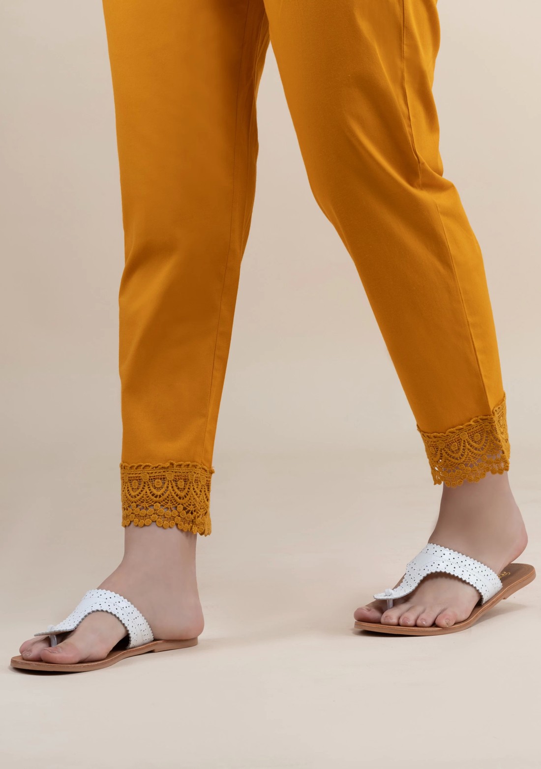 Mustard Cotton Lycra Narrow Hem Pants With Lace