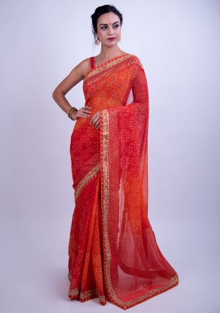 Orange and Coral Bandhej Foil Printed Georgette Saree